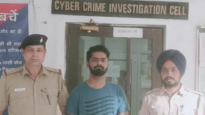 The accused, who duped the Chandigarh resident of  ₹3 lakh on pretext of ensuring a job for her son in Merchant Navy, in the custody of Chandigarh police. (HT Photo)
