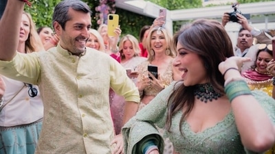 Kanika rounded off her attire by draping a heavily-embroidered georgette dupatta on her arms. It featured the same embellishments and the addition of beaded tassel embroidery on the borders. (Instagram) Kanika rounded off her attire by draping a heavily-embroidered georgette dupatta on her arms. It featured the same embellishments and the addition of beaded tassel embroidery on the borders. (Instagram)