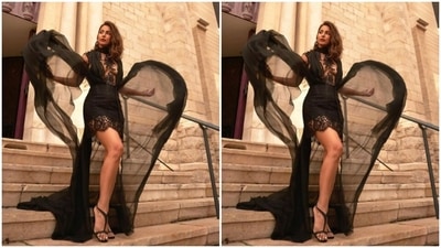 Styled by fashion stylist Sayali Vidya, Hina wore her shoulder-length tresses open in wavy curls with a side part. (Instagram/@realhinakhan)