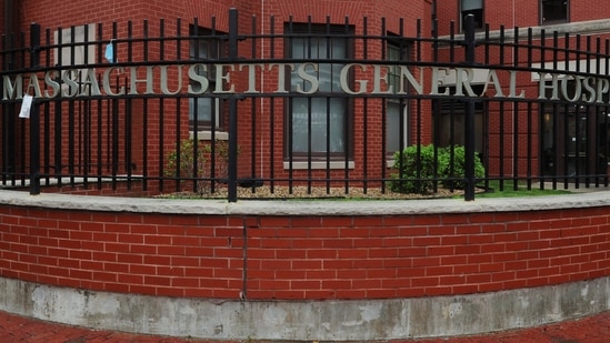 Signage for Massachusetts General Hospital, where a patient is being treated for monkeypox, is pictured on a fence at the hospital in Boston, Massachusetts, on May 19, 2022.&nbsp;(REUTERS)