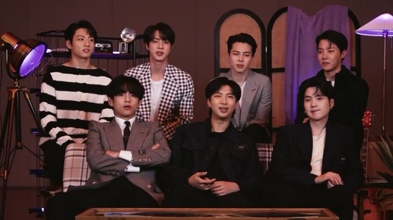 BTS: V, RM, and Suga (front); Jungkook, Jin, Jimin, and J-Hope (back).