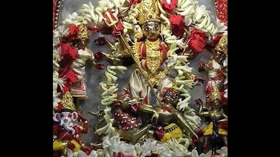 The vajra-dharan mudra is formed by every idol in the Dhakeshwari tableau, even the just-slain Asura.