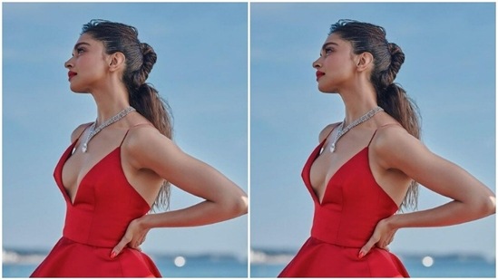 Deepika styled her hair in a messy half bun as she posed for the pictures and made her attire look better.(Instagram/@deepikapadukone)