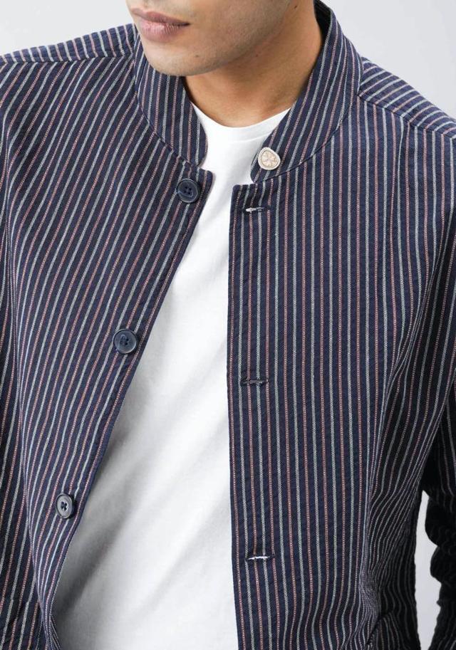 This smart pin-striped jacket is ideal to create a lean and layered look. This smart pin-striped jacket is ideal to create a lean and layered look.