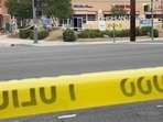 Police investigate the scene of a deadly shooting late Friday, in San Bernardino, California..