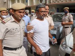 Delhi University Professor Ratan Lal, who was earlier arrested by Delhi Police for his social media post related to Gyanvapi Mosque case, being produced at Tis Hazari Court in New Delhi. Delhi University Professor Ratan Lal, who was earlier arrested by Delhi Police for his social media post related to Gyanvapi Mosque case, being produced at Tis Hazari Court in New Delhi.