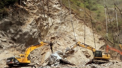 Search and rescue operations in progress in the aftermath of the collapse of an under-construction tunnel on the Jammu-Srinagar national highway near Khooni Nallah, in Ramban. (Imran Nissar) Search and rescue operations in progress in the aftermath of the collapse of an under-construction tunnel on the Jammu-Srinagar national highway near Khooni Nallah, in Ramban. (Imran Nissar)