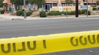 Police investigate the scene of a deadly shooting late Friday, in San Bernardino, California.. (AP)