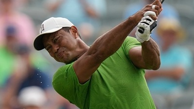 Tiger Woods watches his tee shot on the 10th hole during the second round of the PGA Championship golf tournament at Southern Hills Country Club (AP) Tiger Woods watches his tee shot on the 10th hole during the second round of the PGA Championship golf tournament at Southern Hills Country Club (AP)