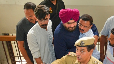 Congress leader Navjot Singh Sidhu surrendered in the CJM court, in Patiala, on Friday, (PTI) Congress leader Navjot Singh Sidhu surrendered in the CJM court, in Patiala, on Friday, (PTI)