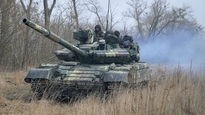 Service members of the Ukrainian armed forces are seen atop of a tank at their positions outside the settlement of Makariv, amid the Russian invasion of Ukraine, near Zhytomyr. (File image) (REUTERS)