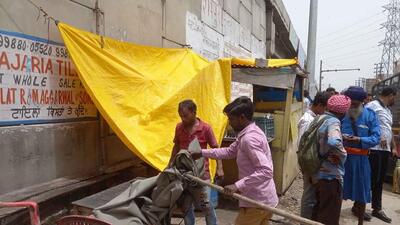 MC teams removed encroachments near Shivpuri chowk in Ludhiana. (HT PHOTO)