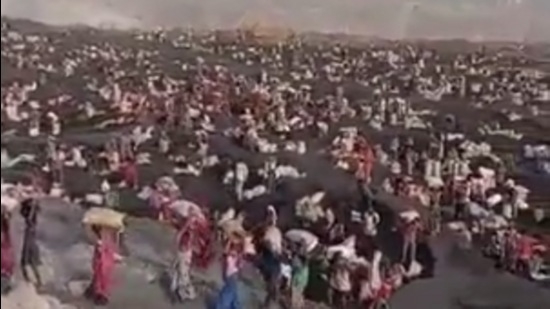A viral video showed a large number of people digging an opencast mine and carrying coal-filled sacks. (Video grab)
