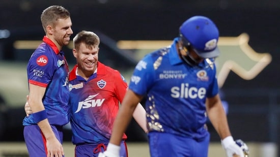 Delhi Capitals' Anrich Nortje celebrates the dismissal of Mumbai Indians' Rohit Sharma during the Indian Premier League 2022&nbsp;(IPL Twitter)
