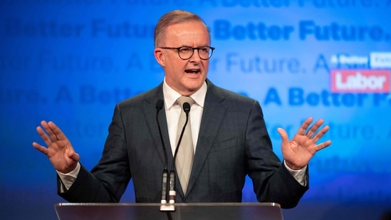 Anthony Albanese gestures as he addresses Labour supporters after winning the 2022 general election at the Federal Labour Reception in Sydney.&nbsp;(AFP)