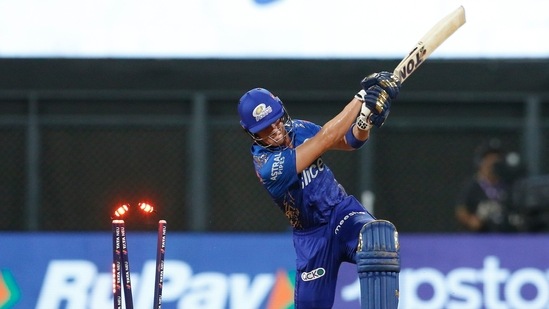 Dewald Brevis of Mumbai Indians being bowled out by Shardul Thakur of Delhi Capitals, during the Indian Premier League 2022 (PTI)