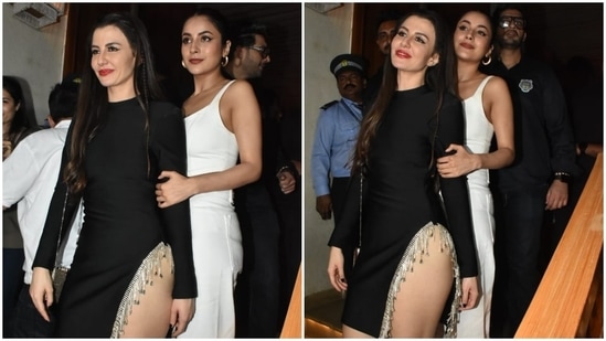 Meanwhile, birthday girl Giorgia Andriani slipped into a little black dress for her late-night bash. The mini-length ensemble comes with long sleeves, a round neckline, a cut-out on the back, a risqué thigh-high slit adorned with shimmering embellished tassels and a bodycon silhouette.(HT Photo/Varinder Chawla)