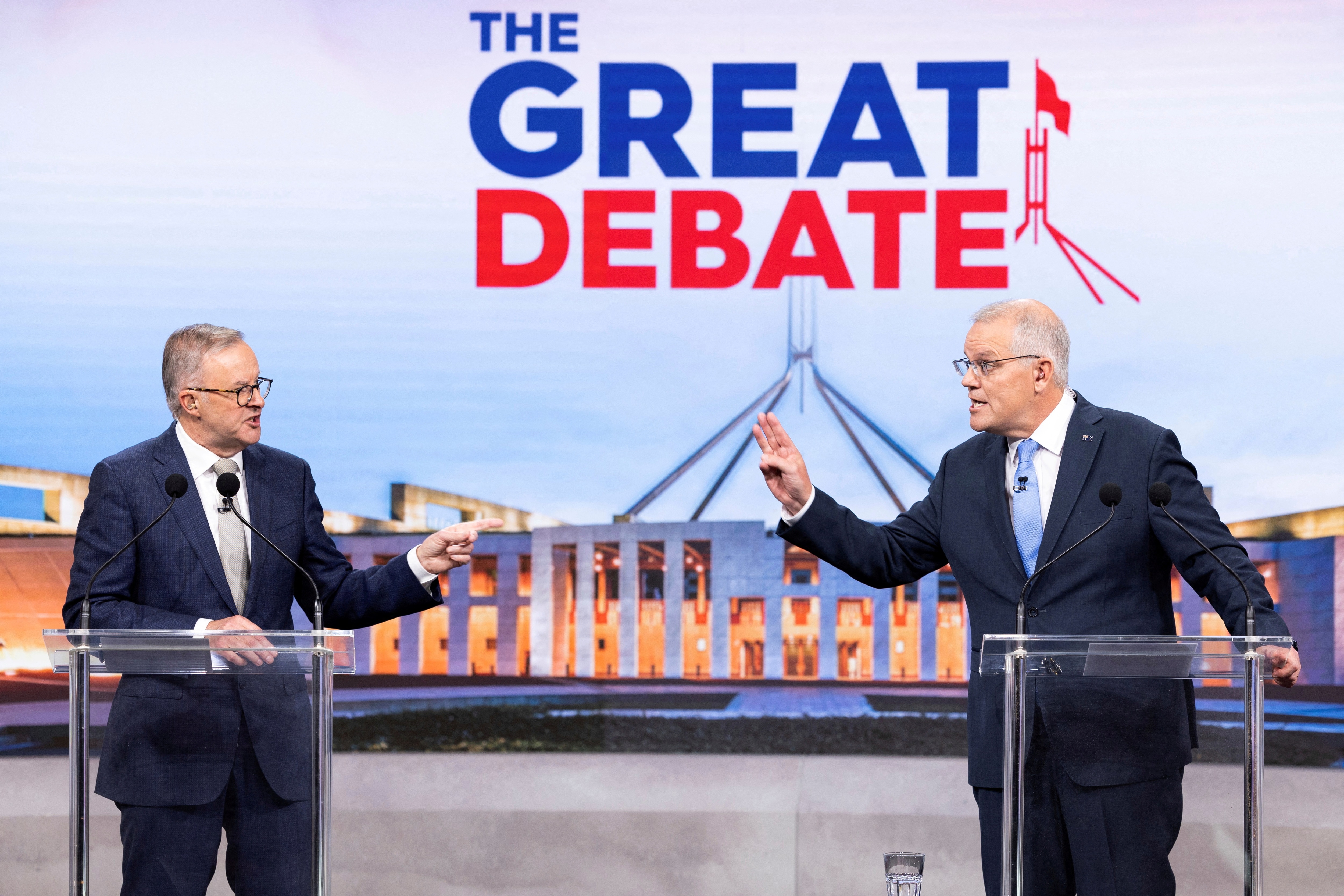 Australian incumbent Prime Minister Scott Morrison and Opposition Leader Anthony Albanese debate on live television. (REUTERS)