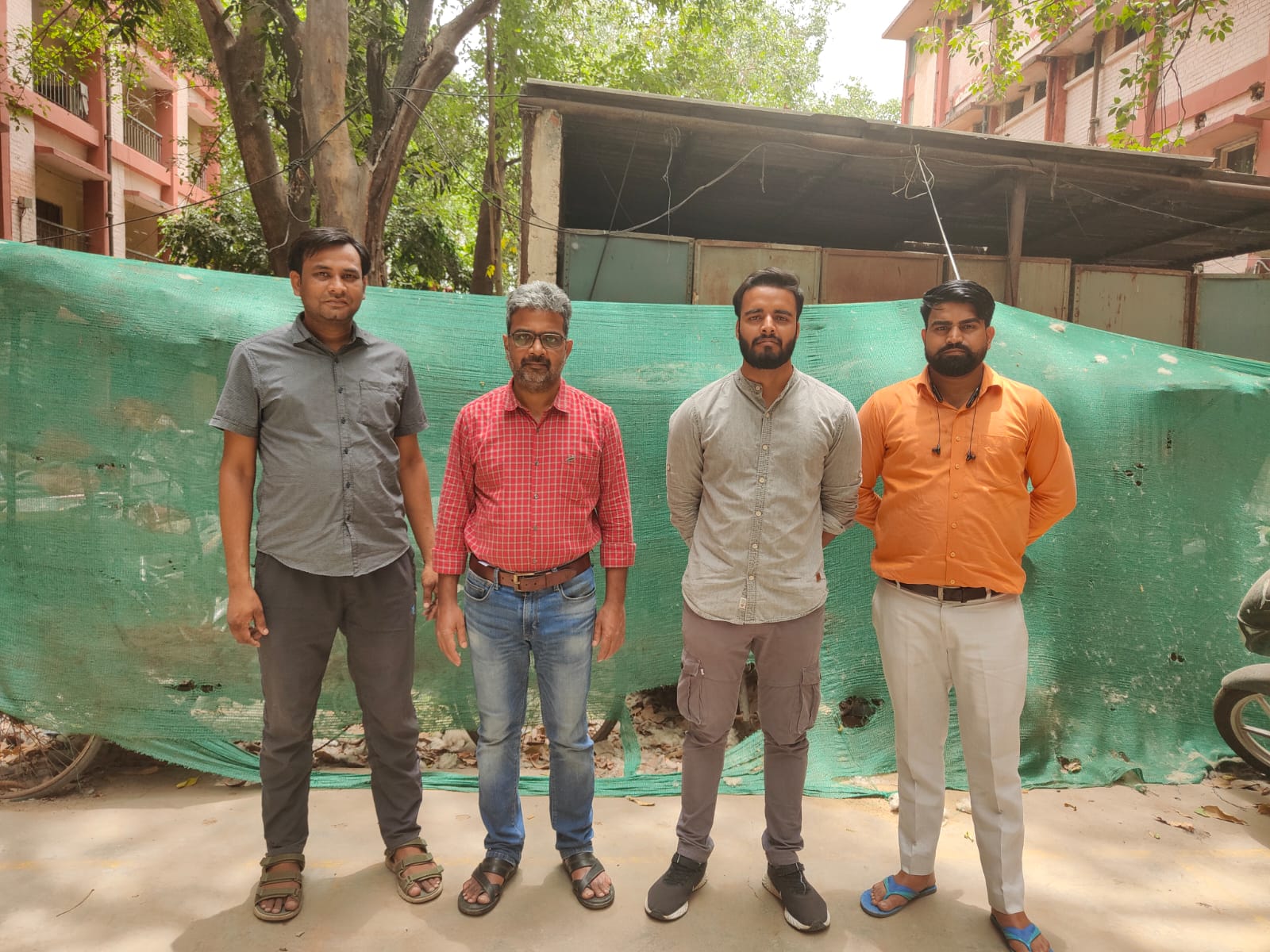 Ratan Lal (in red shirt), associate professor at Delhi University’s Hindu College, had earlier said he had simply posed a question as a student of history.