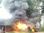 Visuals of Assam police station wrapped in flames were shared by ANI. Visuals of Assam police station wrapped in flames were shared by ANI.