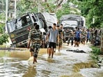 An army vehicle gets stuck in a flood-hit area in Nagaon. PTI An army vehicle gets stuck in a flood-hit area in Nagaon. PTI