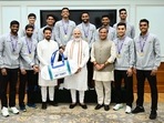 Prime Minister Narendra Modi, union sports minister Anurag Thakur and Assam chief minister Himanta Biswa Sarma with the members of Thomas Cup-winning Indian men's badminton team. (Twitter/Anurag Thakur) Prime Minister Narendra Modi, union sports minister Anurag Thakur and Assam chief minister Himanta Biswa Sarma with the members of Thomas Cup-winning Indian men's badminton team. (Twitter/Anurag Thakur)