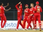 Mumbai: Punjab Kings players celebrate the wicket of Priyam Garg of the Sunrisers Hyderabad during T20 cricket match 70 of the Indian Premier League 2022 (IPL season 15) between the Sunrisers Hyderabad and the Punjab Kings, at the Wankhede Stadium in Mumbai, Sunday, May 22, 2022. (Sportzpics for IPL/PTI Photo)(PTI05_22_2022_000157A)(PTI)