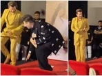Karan Johar tried to touch Anil Kapoor's feet.
