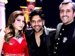 Kanika Kapoor and Gautam Hathiramani posed with Guru Randhawa, at their reception.