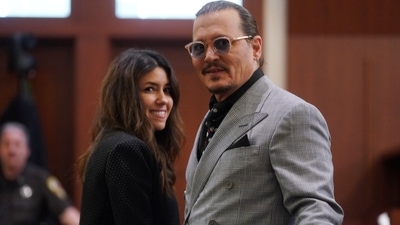 Actor Johnny Depp and his attorney Camille Vasquez look on during Depp's defamation case against ex-wife, actor Amber Heard at Fairfax County Circuit Court in Fairfax, Virginia, U.S., May 19, 2022. Shawn Thew/Pool via REUTERS (REUTERS)