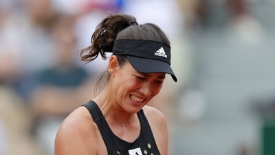 Spain's Garbine Muguruza reacts during her first round match against Estonia's Kaia Kanepi (REUTERS)
