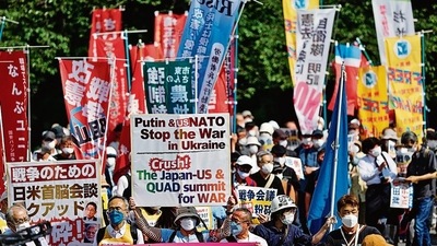 Protesters march against the talks between the US, Japan and other Quad leaders in Tokyo, Japan. REUTERS Protesters march against the talks between the US, Japan and other Quad leaders in Tokyo, Japan. REUTERS