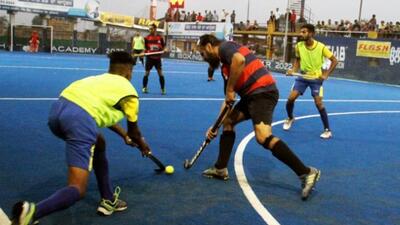 Players in action during a match at Olympian Prithipal Singh Hockey Festival being held in Ludhiana. Sahnewal Club defeated Jarkhar Academy 2-1 in a penalty shootout after the game ended tied 7-7. Despite the loss, Jarkhar Academy qualified to the semi-finals having the maximum 12 points. (HT PHOTO)