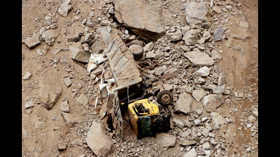 A vehicle is completely damaged after the collapse of an under-construction tunnel on the Jammu-Srinagar national highway near Khooni Nallah, in Ramban on Saturday. (ANI)