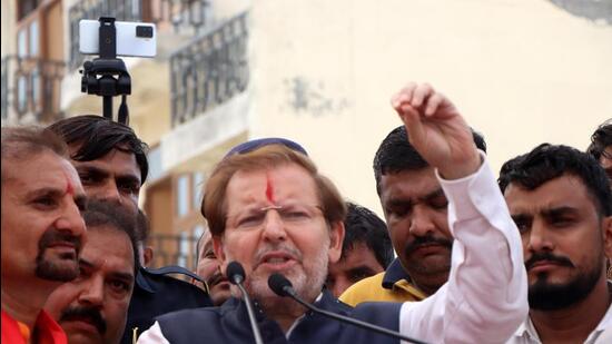 Rohtak MP Arvind Sharma addressing a gathering in Pehrawar village of Rohtak on Sunday. (Manoj Dhaka /HindustanTimes)