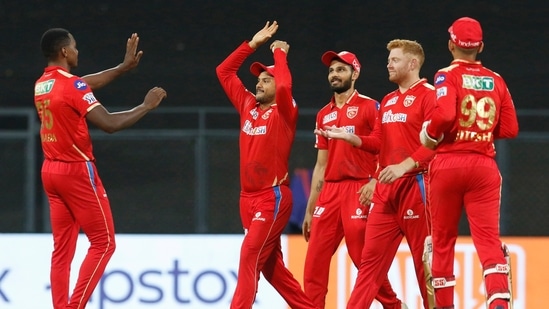 Mumbai: Punjab Kings players celebrate the wicket of Priyam Garg of the Sunrisers Hyderabad during T20 cricket match 70 of the Indian Premier League 2022 (IPL season 15) between the Sunrisers Hyderabad and the Punjab Kings, at the Wankhede Stadium in Mumbai, Sunday, May 22, 2022. (Sportzpics for IPL/PTI Photo)(PTI05_22_2022_000157A)(PTI)