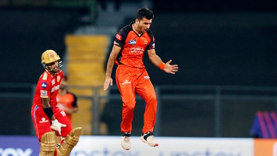 Mumbai: Fazalhaq Farooqi of the Sunrisers Hyderabad celebrates the wicket of Jonny Bairstow of Punjab Kings during T20 cricket match 70 of the Indian Premier League 2022 (IPL season 15) between the Sunrisers Hyderabad and the Punjab Kings, at the Wankhede Stadium in Mumbai, Sunday, May 22, 2022. (Sportzpics for IPL/PTI Photo)(PTI05_22_2022_000189B)(PTI)