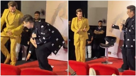 Karan Johar tried to touch Anil Kapoor's feet.