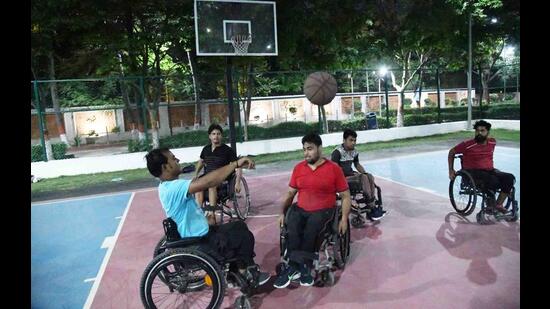 Specially-abled players practice ahead of the East Zone wheelchair basketball championship in Patna. (Santosh Kumar/HT Photo)