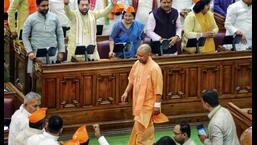 Uttar Pradesh Chief Minister Yogi Adityanath arrived in Lucknow's Vidhan Bhavan on Monday to attend the first session of the 18th UP Assembly.  (ANI photo)