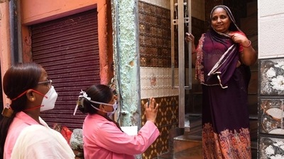 ASHA workers on a door-to-door screening survey for Covid. (HT file)