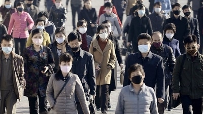 FILE PHOTO: People wearing protective face masks commute amid concerns over the new coronavirus disease (COVID-19) in Pyongyang, North Korea. (REUTERS)
