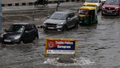 The Gurugram Traffic Police on Monday asked the residents of the city to consider the option of working from home after heavy rainfall flooded several roads and caused blockades due to uprooted trees. (Vipin Kumar/ Hindustan Times) The Gurugram Traffic Police on Monday asked the residents of the city to consider the option of working from home after heavy rainfall flooded several roads and caused blockades due to uprooted trees. (Vipin Kumar/ Hindustan Times)