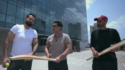 Aamir Khan with Harbhajan Singh and Irfan Pathan. Aamir Khan with Harbhajan Singh and Irfan Pathan.