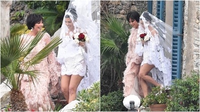 In the end, Kourtney styled her wedding look with a centre-parted sleek bun, nude lip shade, bold eye makeup, glowing skin, dewy base, blushed cheeks, mascara on the lashes and beaming highlighter. (Instagram) In the end, Kourtney styled her wedding look with a centre-parted sleek bun, nude lip shade, bold eye makeup, glowing skin, dewy base, blushed cheeks, mascara on the lashes and beaming highlighter. (Instagram)