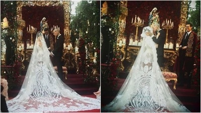 Travis complemented his wife in a double-breasted jacket with peaked lapels and classic trousers with pressed crease, both in superfine Italian black wool and silk satin. He paired the set with a white shirt, a black silk satin bow-tie, a golden cross brooch with black crystals, and dress shoes. (Instagram/@dolcegabbana) Travis complemented his wife in a double-breasted jacket with peaked lapels and classic trousers with pressed crease, both in superfine Italian black wool and silk satin. He paired the set with a white shirt, a black silk satin bow-tie, a golden cross brooch with black crystals, and dress shoes. (Instagram/@dolcegabbana)