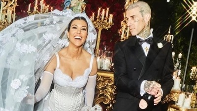 Kourtney Kardashian and Travis Barker have found their happy ending! On Sunday, the couple tied the knot in Portofino, Italy, surrounded by their closest friends and family, and now the pictures from the festivities are going viral. The 43-year-old socialite chose a white ensemble, and the 46-year-old drummer chose a black tuxedo for the occasion. (Instagram/@kourtneykardashian) Kourtney Kardashian and Travis Barker have found their happy ending! On Sunday, the couple tied the knot in Portofino, Italy, surrounded by their closest friends and family, and now the pictures from the festivities are going viral. The 43-year-old socialite chose a white ensemble, and the 46-year-old drummer chose a black tuxedo for the occasion. (Instagram/@kourtneykardashian)