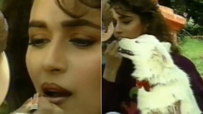 Madhuri Dixit's stills from the sets of Hum Aapke Hain Koun. Madhuri Dixit's stills from the sets of Hum Aapke Hain Koun.