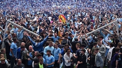 Manchester City fans invade pitch after Premier League title triumph (Twitter/Priceless_Silva) Manchester City fans invade pitch after Premier League title triumph (Twitter/Priceless_Silva)