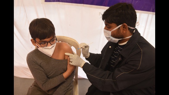 A beneficiary receiving Covid vaccine. The state has reported a total of 20,78,764 Covid cases and 23,519 deaths till now (HT FILE PHOTO)